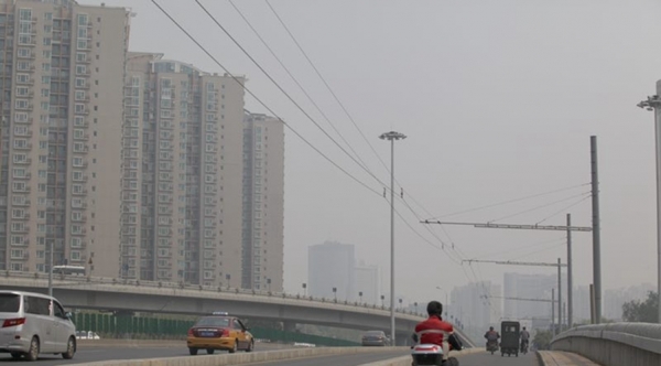 ​北京空气质量不佳 口罩成出行标配-图5