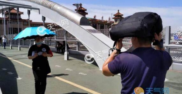 北京今迎首个高温预警 市内最高气温飙至35℃