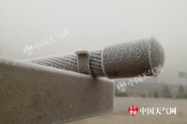 北京今晨现雾凇局地飘雪 明起空气质量好转