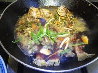 咸菜冬笋烧黄鱼的做法步骤7