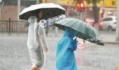 华南五一假期雨中度过 沙尘袭扰北方