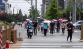广东“炎值”飙至38℃伴有雷阵雨 市民出行需防高温和雷雨