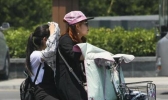 广东气温飙至35℃闷热感十足! 考生要注意防暑降温及防晒