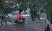 北京解除暴雨预警强降雨转战东北 江南至重庆一带有37℃高温